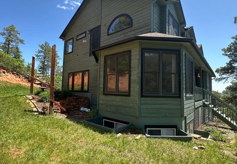 dark green stained home