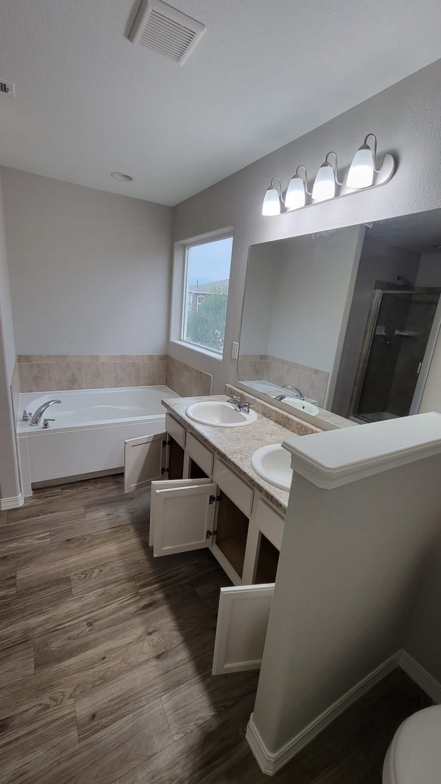 bathroom with double sink vanity with soaking tub Preview Image 1