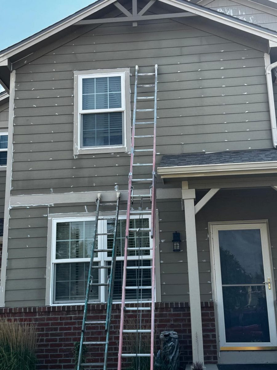 ladder leaning against house with paint patching Preview Image 4