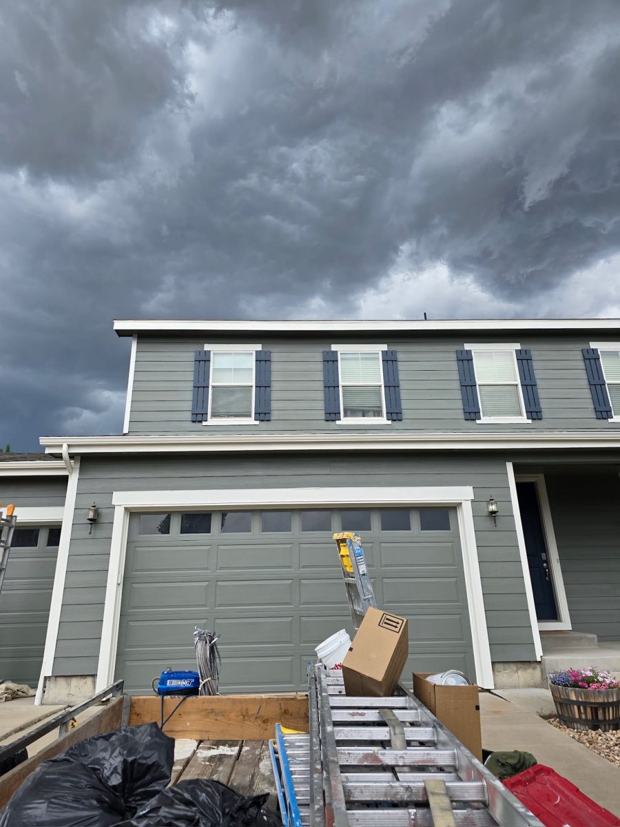 home with grey painted siding and blue shutters Preview Image 2