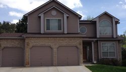 Exterior painting by CertaPro house painters in St. Andrews Country Club, CO