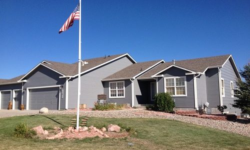 Exterior painting by CertaPro house painters in Peyton, CO