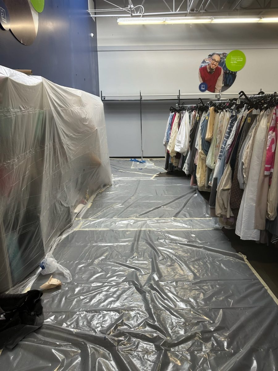 goodwill interior with plastic drop cloths for painting Preview Image 2