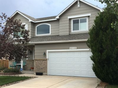 Exterior painting by CertaPro house painters in Springs Ranch, CO