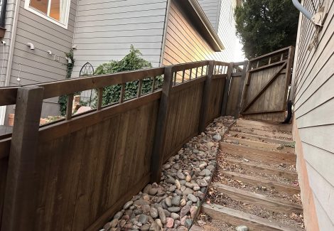 wooden fence with dark stain