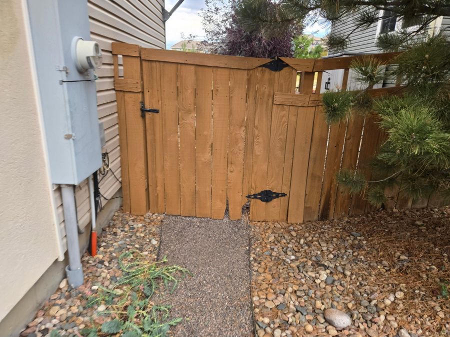 stained fence surrounding home Preview Image 2