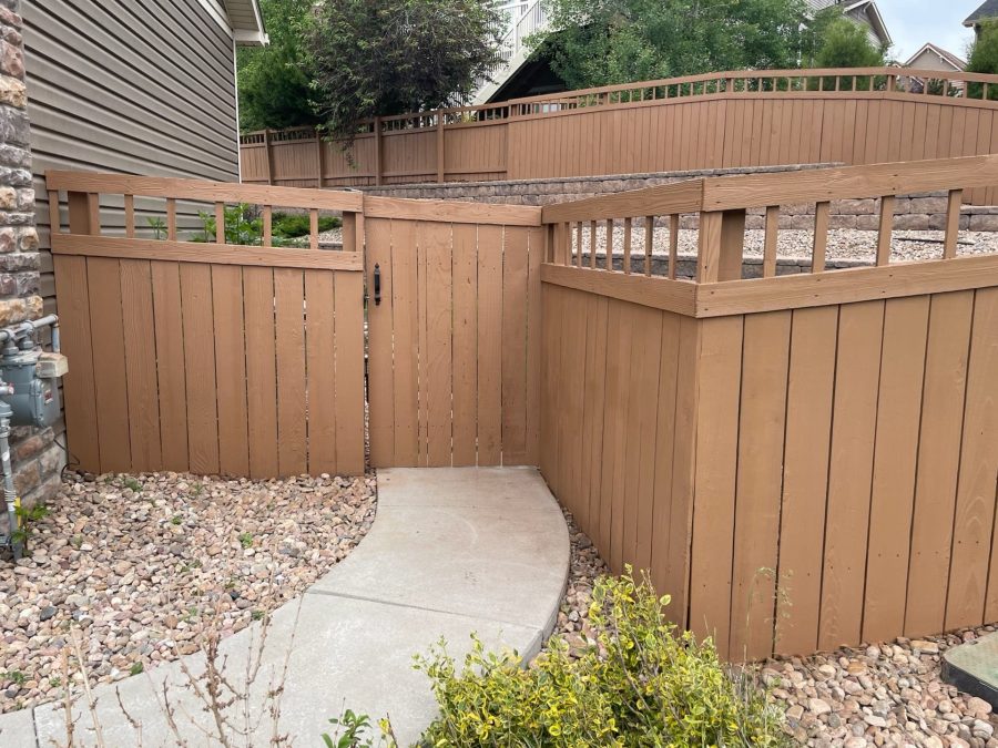 painted fence against house Preview Image 1