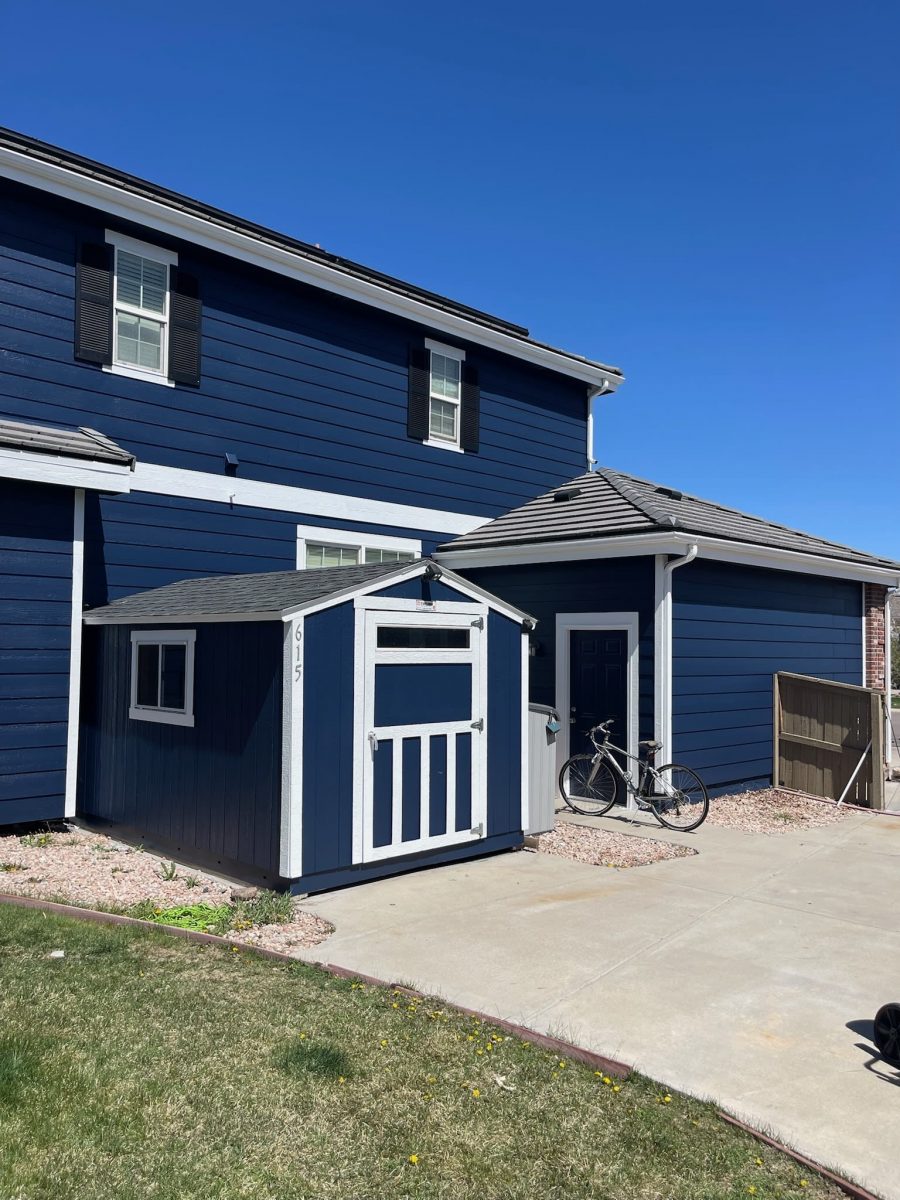 side of house and shed with blue siding Preview Image 2