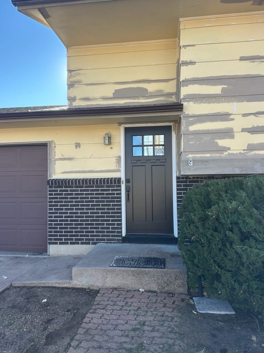 house with yellow siding during repaint Preview Image 5
