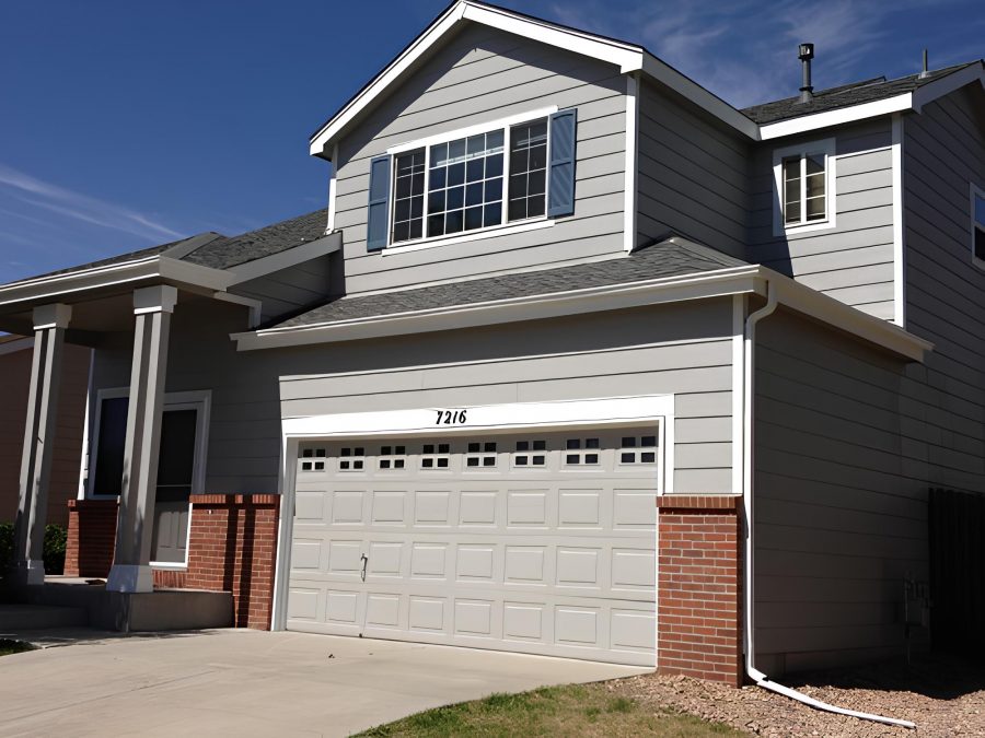 Silver Siding and Brick Exterior