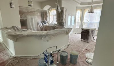 home interior with protective plastic during paint project
