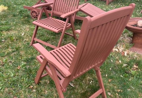 stained wooden deck chairs