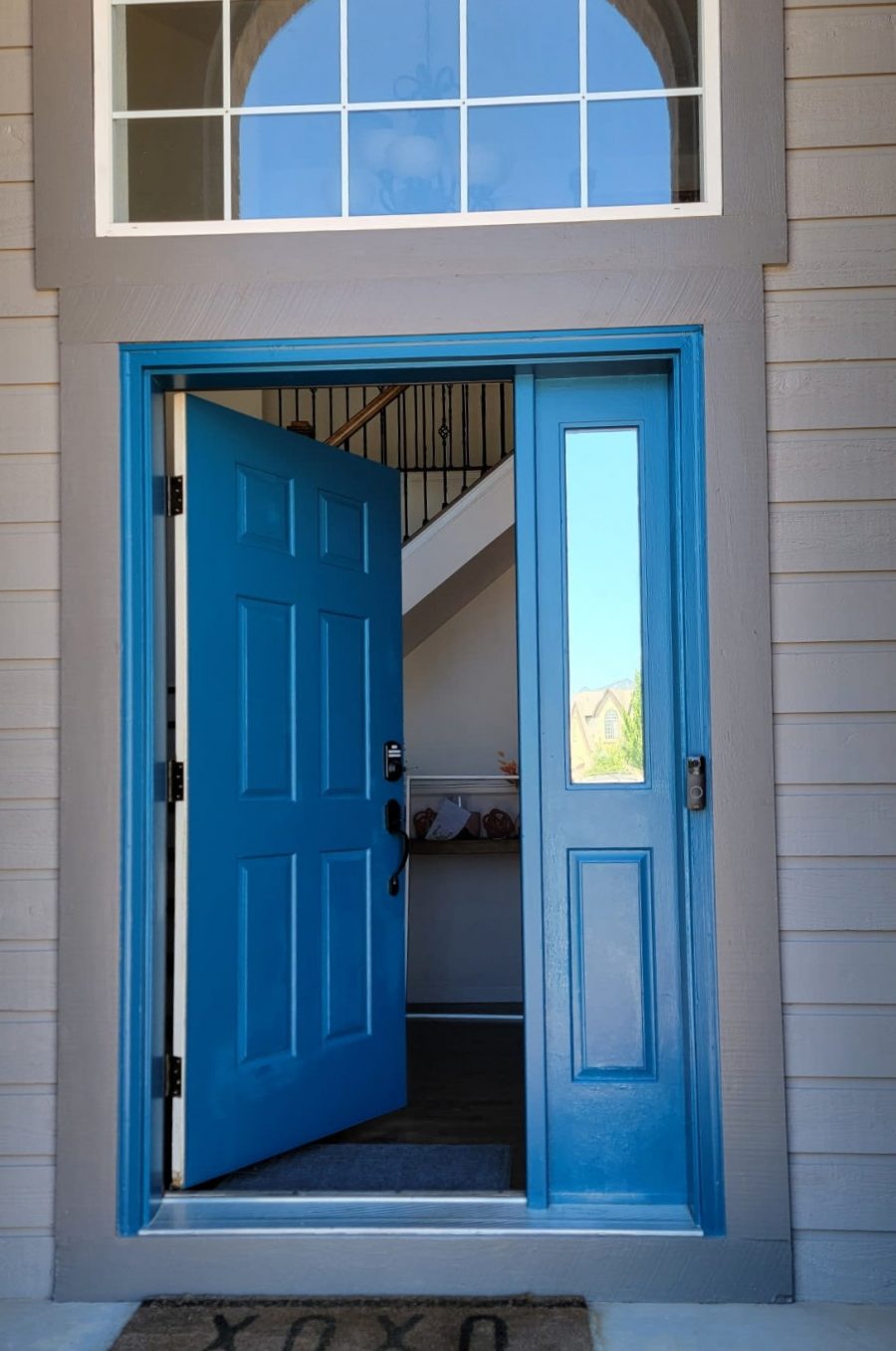 blue painted front door of home Preview Image 2