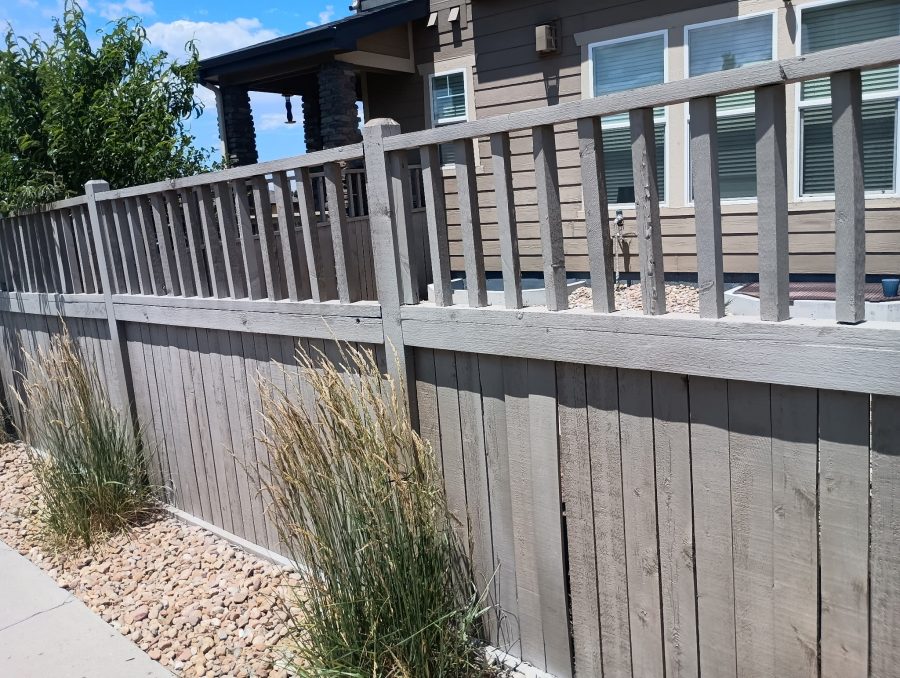 stained wooden fence surrounding home Preview Image 1