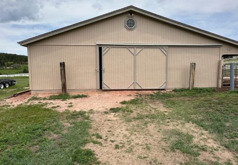 front of repainted barn