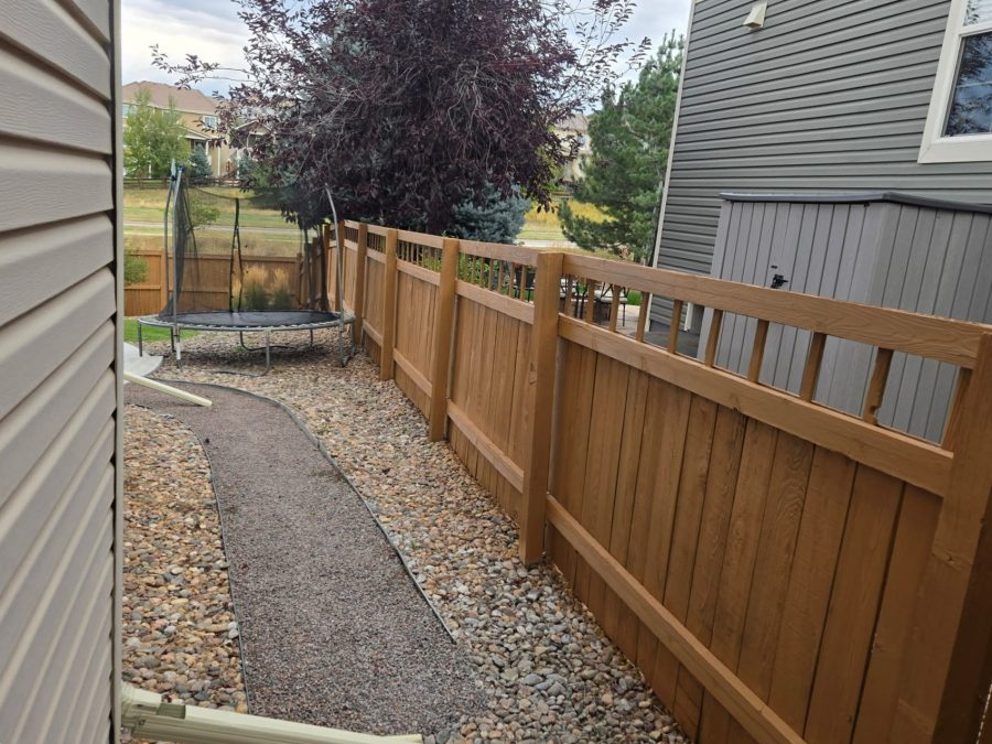 stained fence surrounding home Preview Image 3