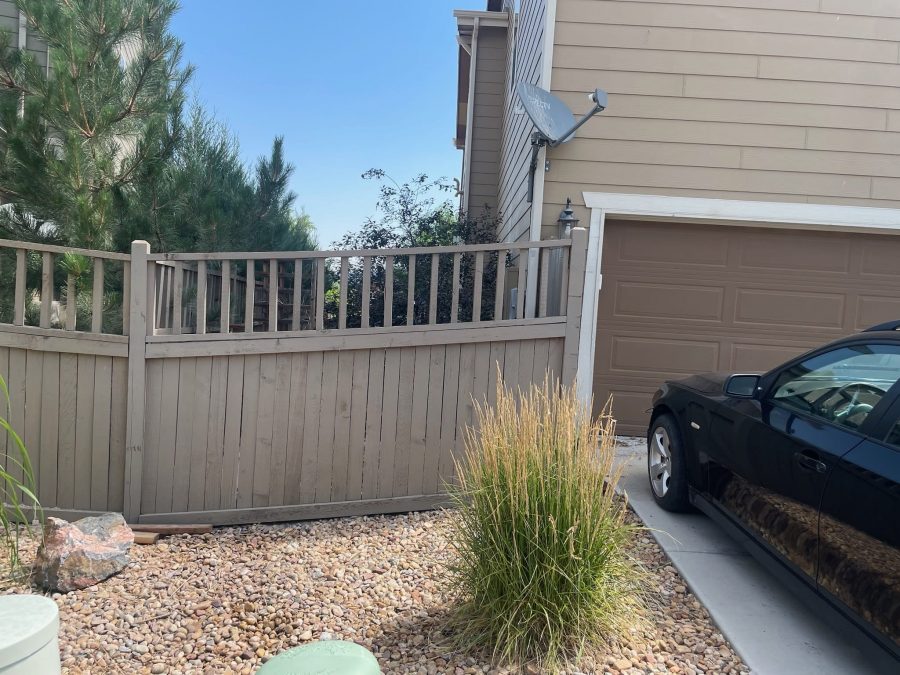 stained wooden fence surrounding home Preview Image 3