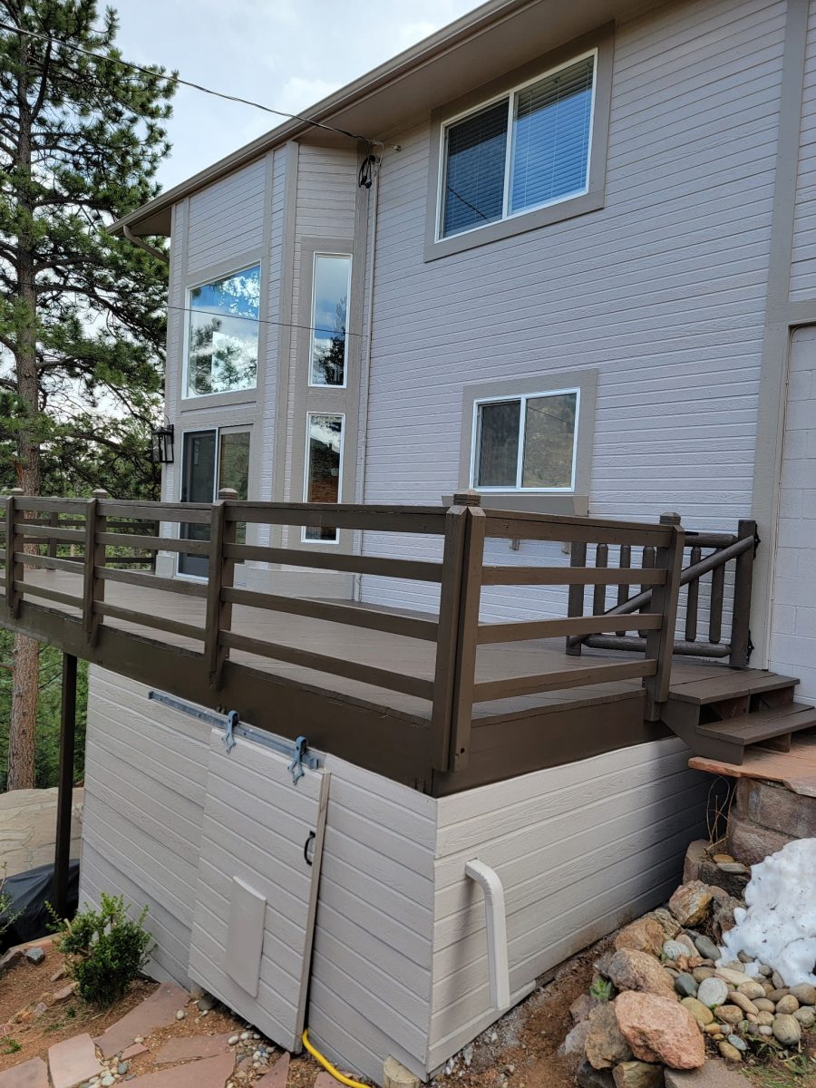 dark brown painted wooden deck attached to home Preview Image 3