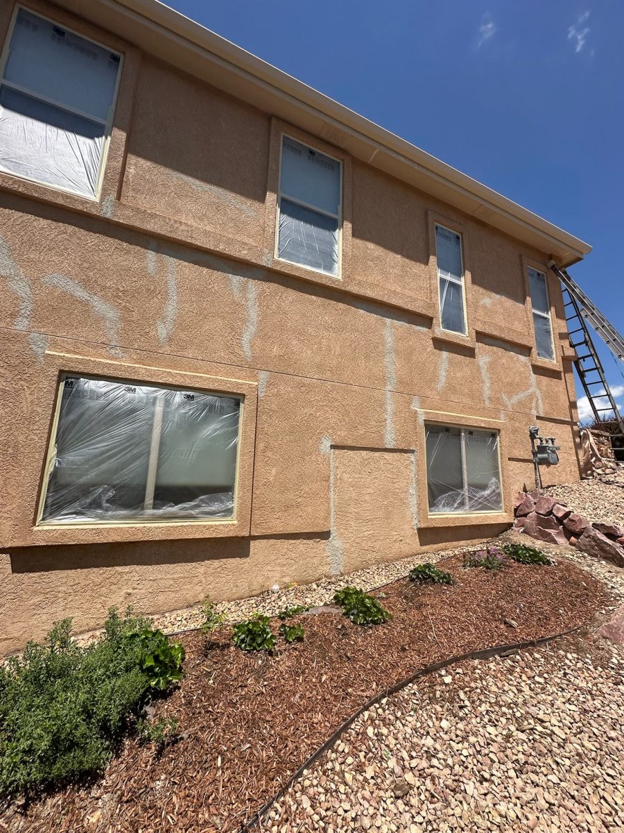 rear side of stucco house with patched cracks Preview Image 4