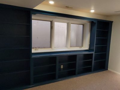 blue painted built-in shelves