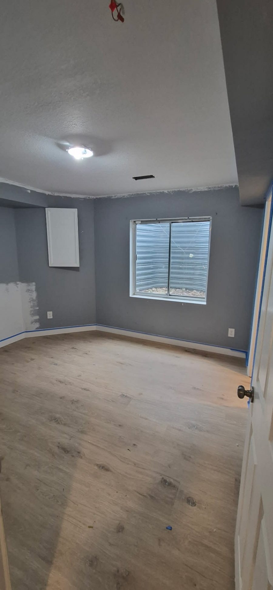 gray interior walls with primer during repaint Preview Image 7