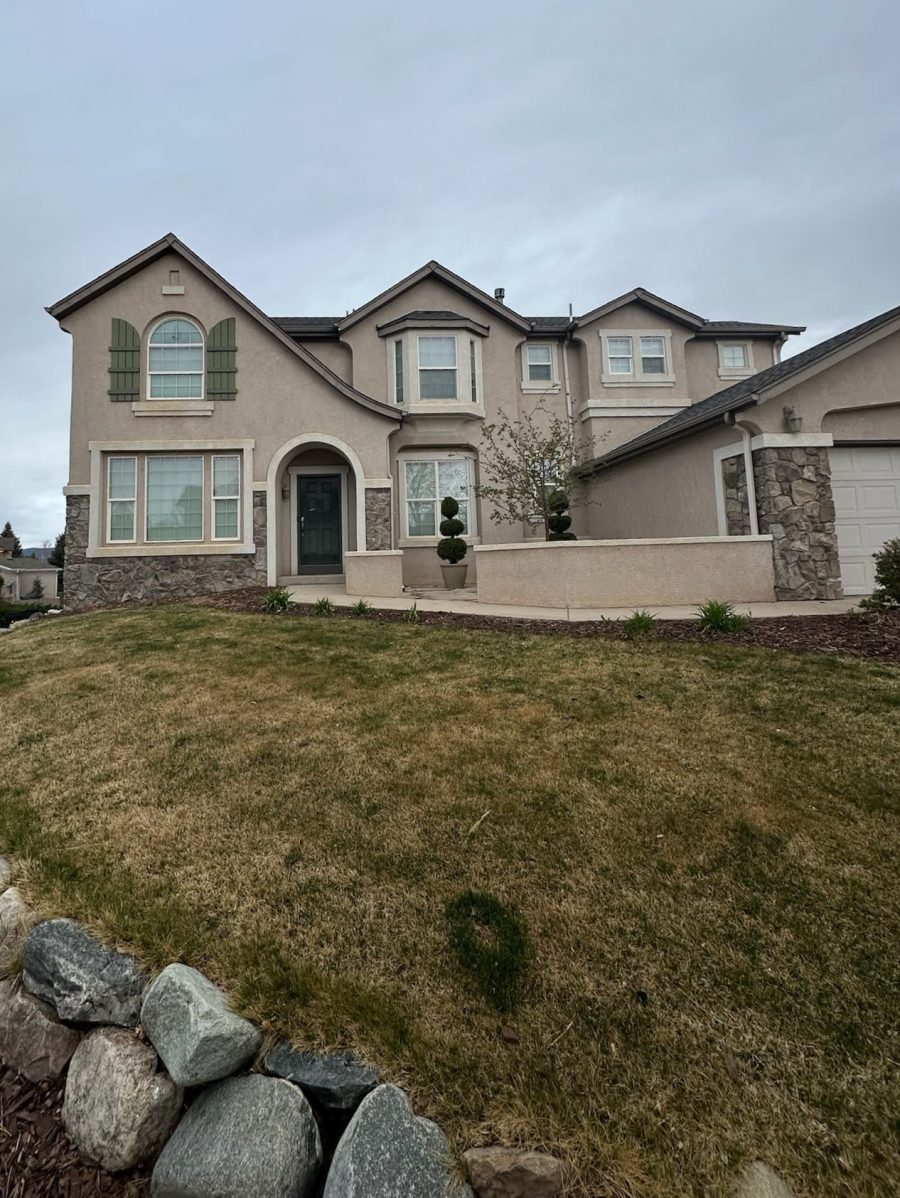 stucco house exterior after repaint