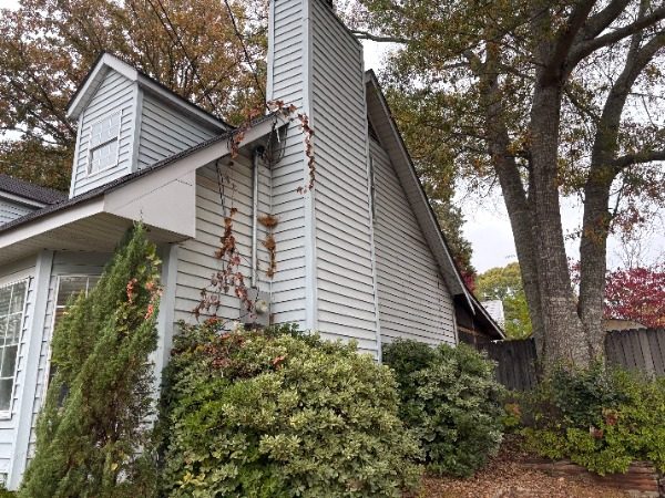 house exterior with worn white siding Preview Image 7