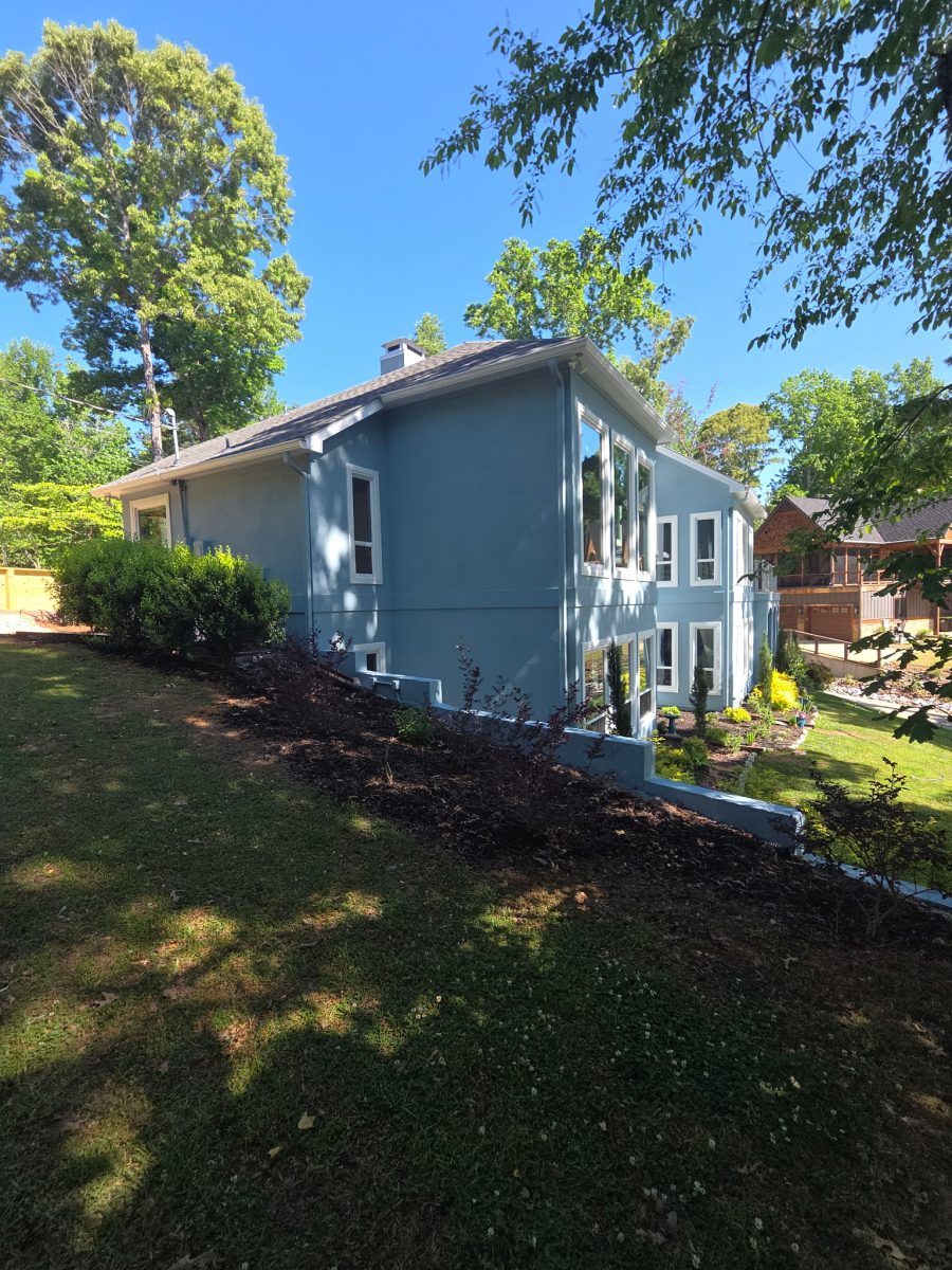 house exterior painted light blue with white window trim Preview Image 1