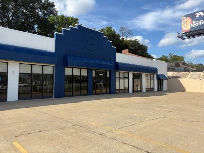 retail building facade painted blue and white