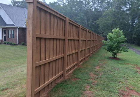 stained wooden privacy fence