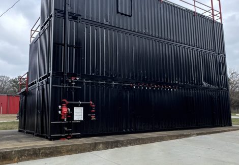 black painted metal structure with red railings