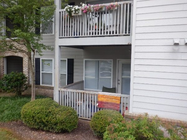 exterior of condo building with rusted balcony railings Preview Image 4