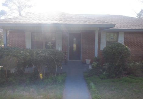 front of brick house