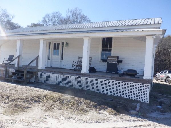 front of house with worn exterior paint Preview Image 7