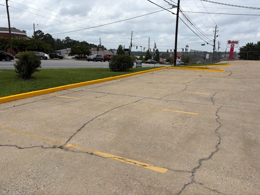 yellow painted parking lot curb Preview Image 4