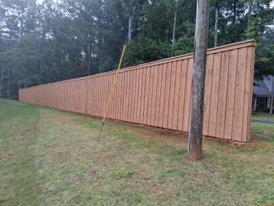 stained wooden privacy fence