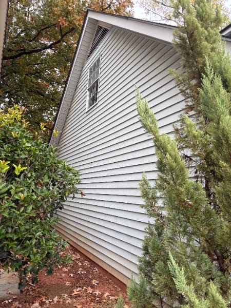 house exterior with worn white siding Preview Image 6