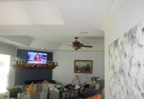 living room with popcorn ceiling