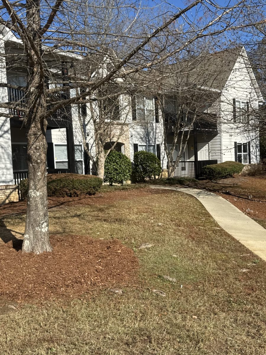 exterior of condo building with black painted balcony railings Preview Image 1