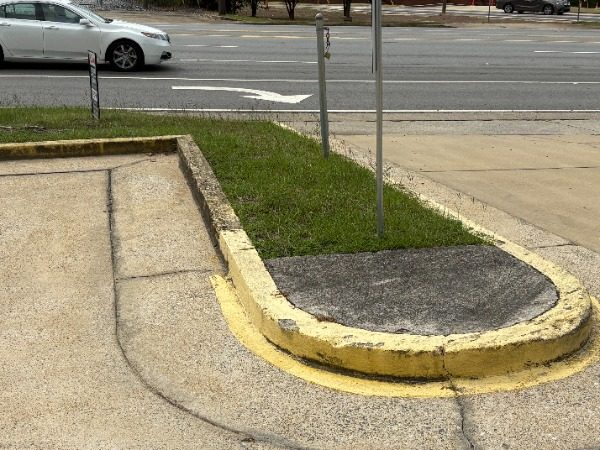 parking lot curb with worn paint Preview Image 10