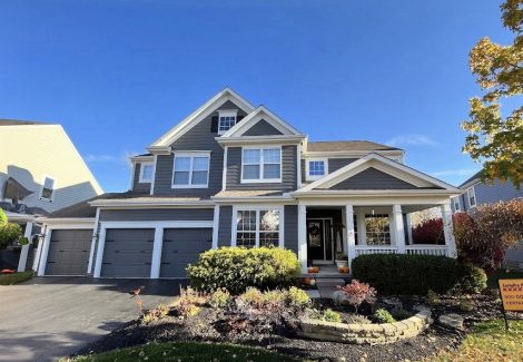 painted house exterior with white trim