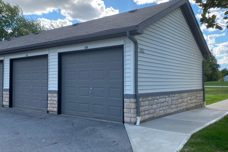 Emerson Park Apartments Exterior painting After of a garage Preview Image 5