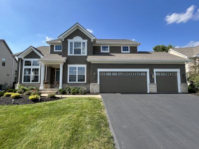 painted house exterior with white trim