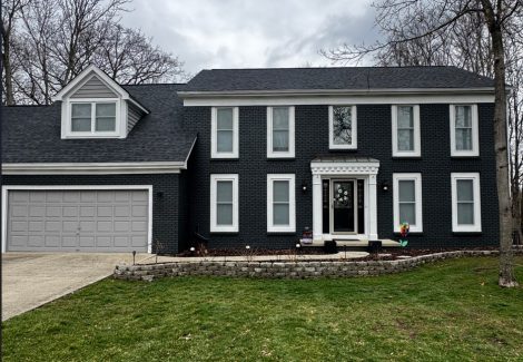 painted house exterior with white trim