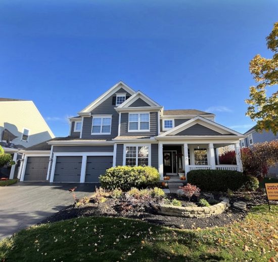 painted house exterior with white trim