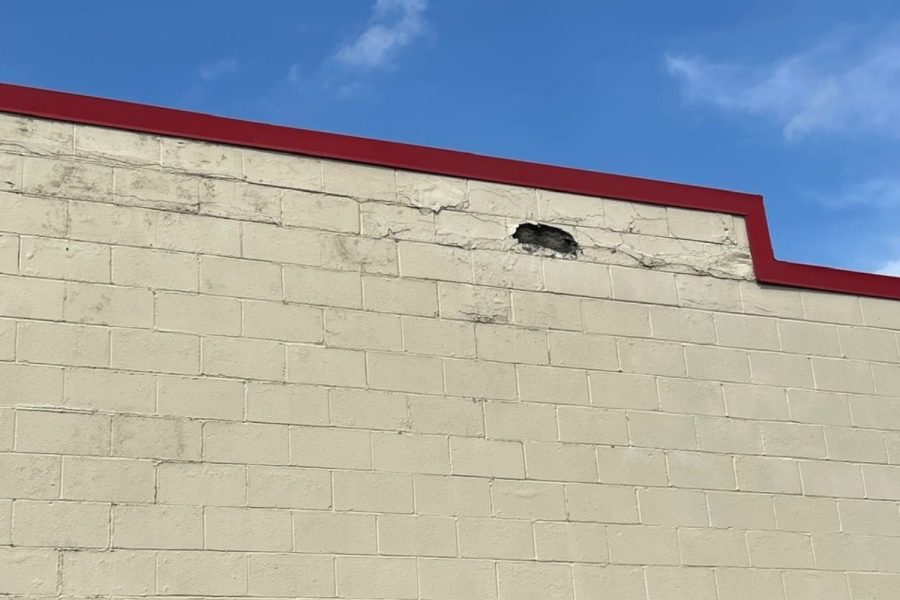 Columbus Commercial Exterior Repainting Project paint damage on side of building before photo Preview Image 1