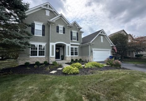 painted house exterior with white trim