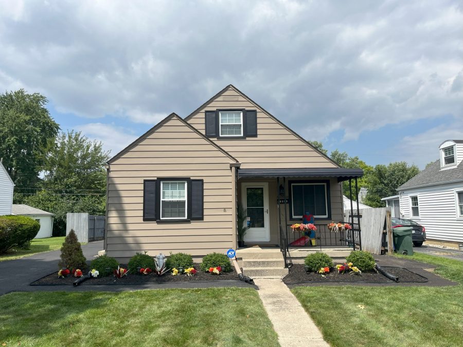 house with beige siding and black trim Preview Image 1