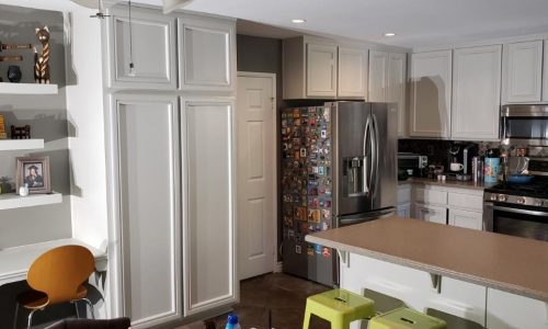 A bright kitchen cabinet refinishing