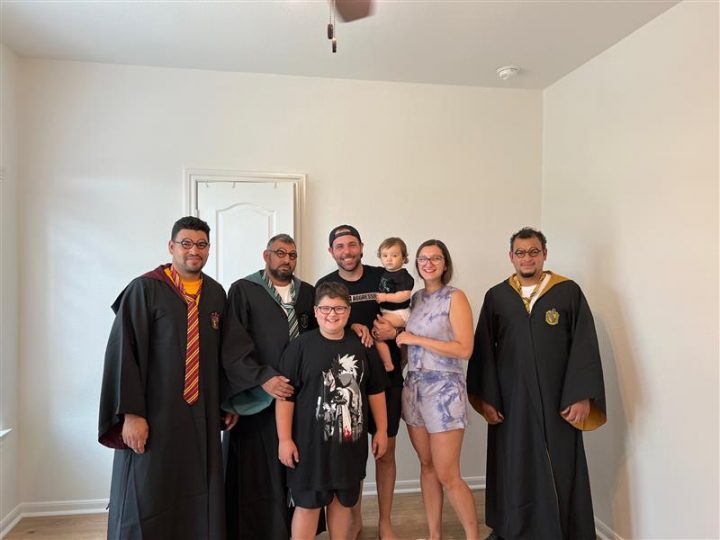 Trent's Family with the Painting Team after we painted his room!